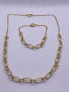 Pure 18k Carat Yellow Gold necklace and bracelet set