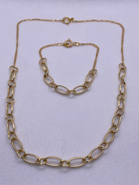 Pure 18k Carat Yellow Gold necklace and bracelet set